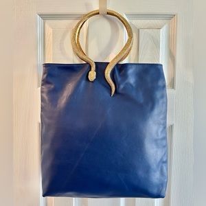 Moss mills snake bag 100% leather. Metal handles nwot magnet closure